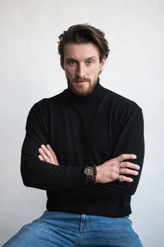 Adam B.