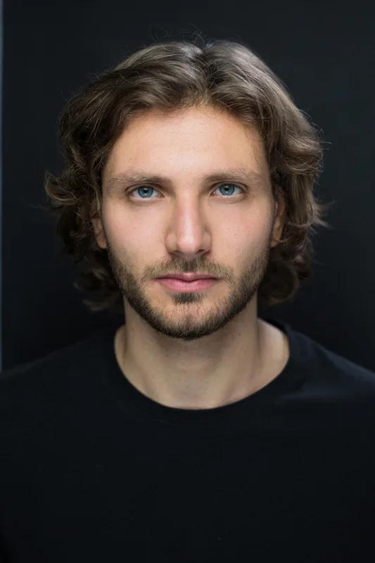 Adam R.