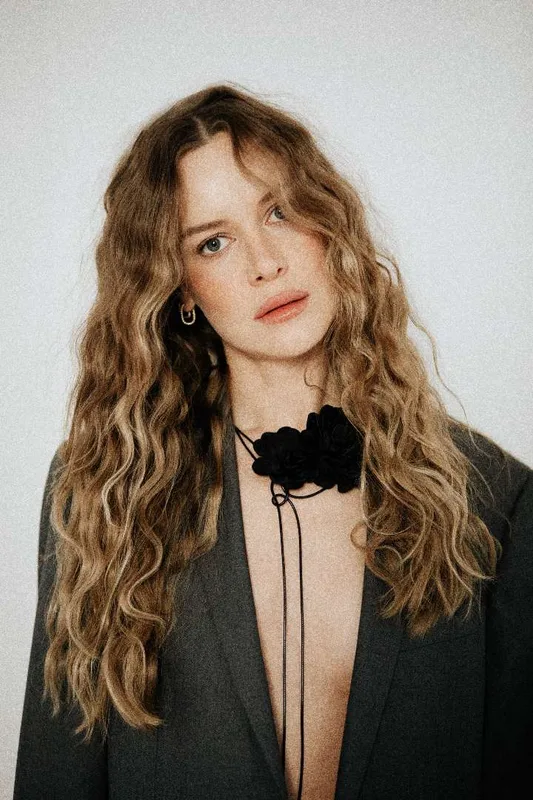 Laura K.